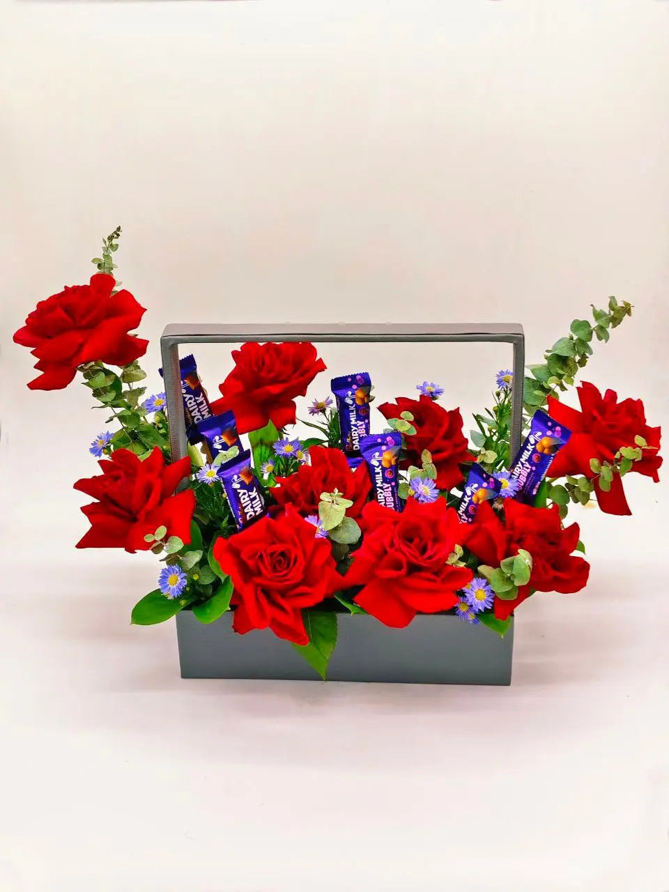 Sweet Scarlet Tray – Red Roses, Cadbury Chocolates & Aster in Handle Tray (UAE Delivery) - OnlineGifts