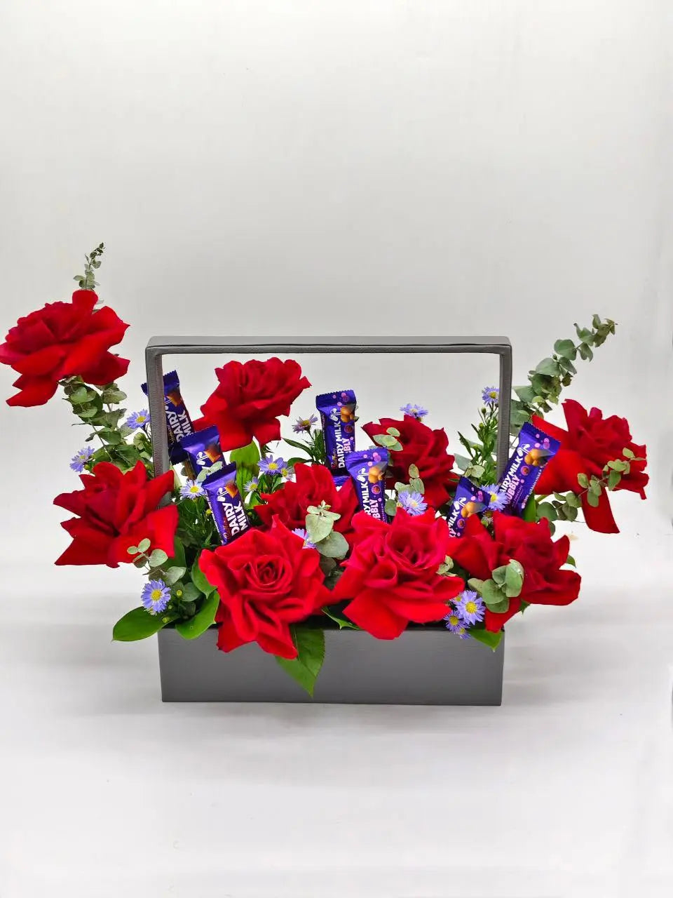 Sweet Scarlet Tray – Red Roses, Cadbury Chocolates & Aster in Handle Tray (UAE Delivery) - OnlineGifts