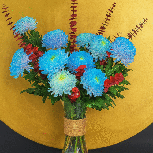 Blue Delistar Flower Arrangement in Cylinder Glass