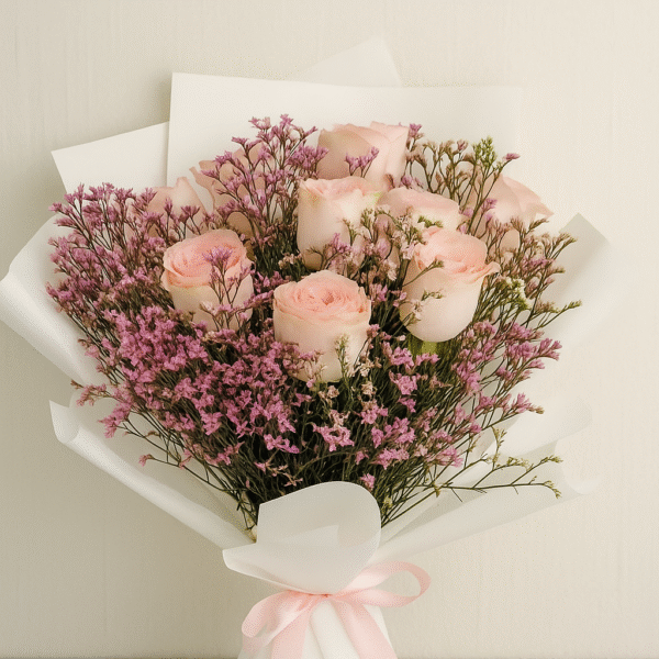 Pink Elegance Delight – 10 Pink Esperance Roses with Limonium (UAE Delivery)