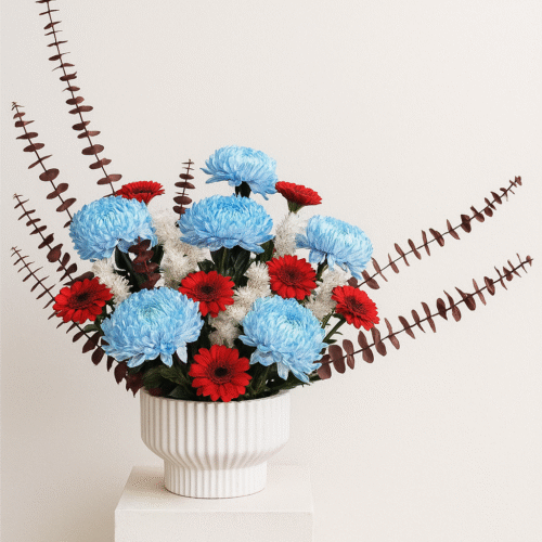 Red Gerbera & Blue-White Delistar Vase Arrangement – Elegant Porcelain Vase Flowers UAE