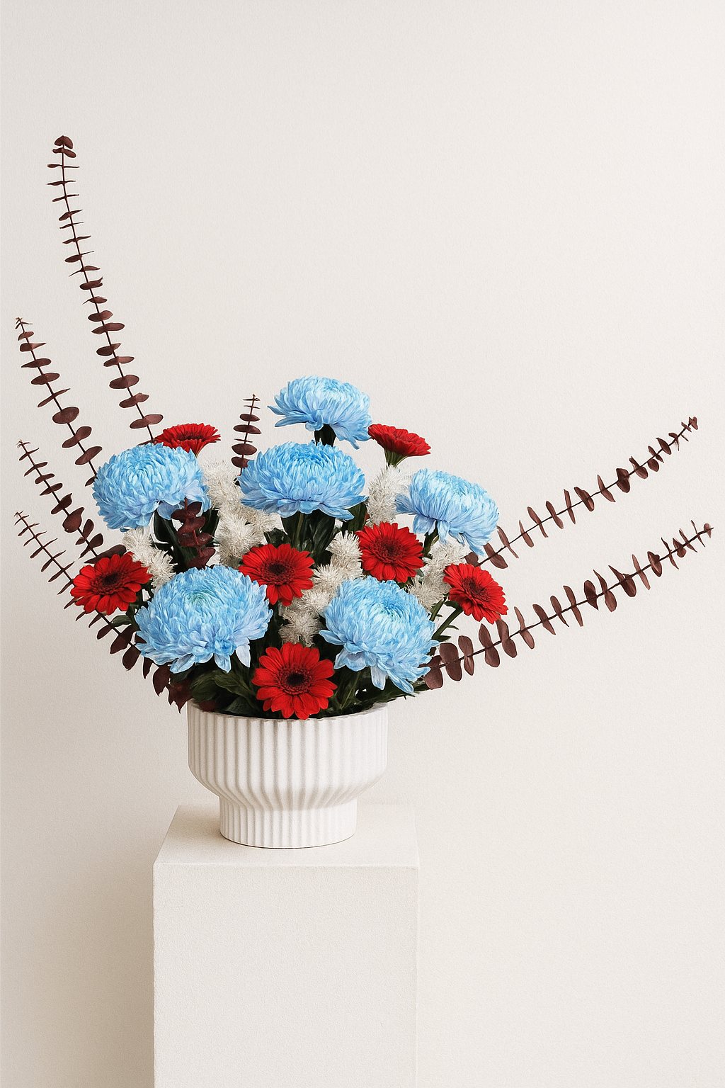 Red Gerbera & Blue Delistar Porcelain Pot | Elegant Fresh Flower Arrangement UAE