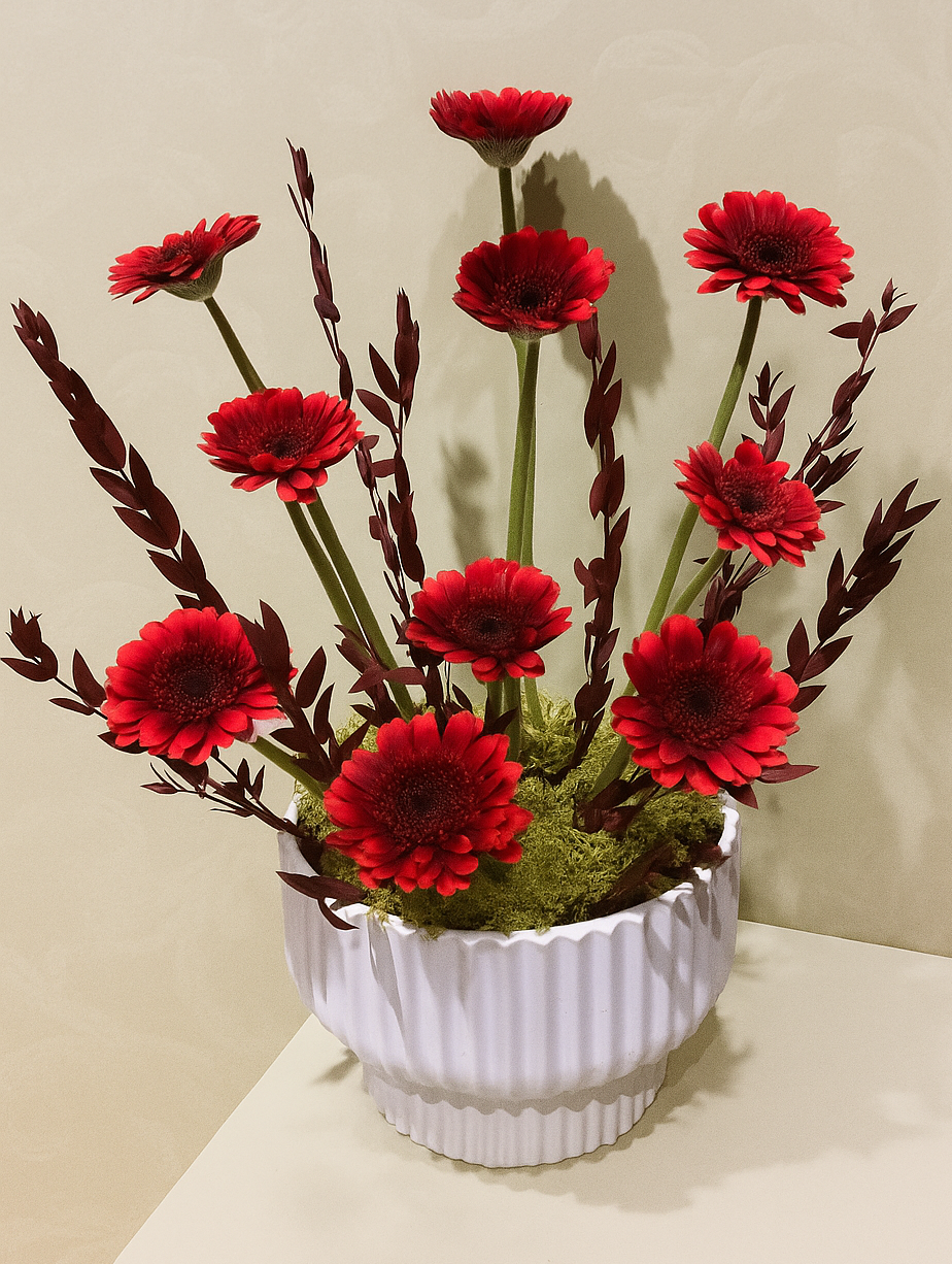 Red Gerbera in White Porcelain Basket – Elegant Flower Arrangement UAE