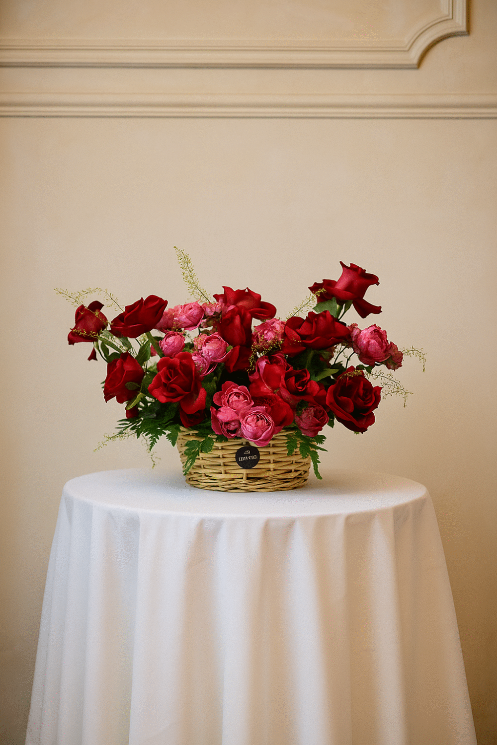 Rosy Bombshell – Red Roses & Bombastic Spray Roses in Elegant Basket (Delivery in UAE)