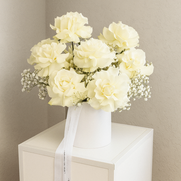 White Garden Rose Basket | 10 Fully Bloomed Roses with Gypsos in White Basket UAE