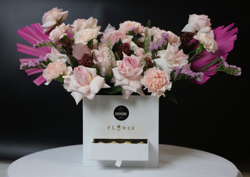 Pink Serenade – Fresh O’Hara Roses, Carnations & Ferrero Rocher in White Box (Delivery in UAE)
