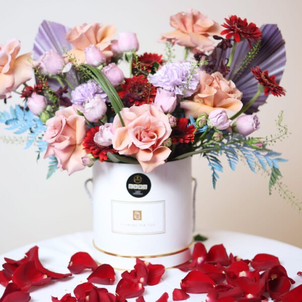 Peach Whispers – Fresh Artistic Peach & Purple Flower Arrangement (Delivery in UAE)