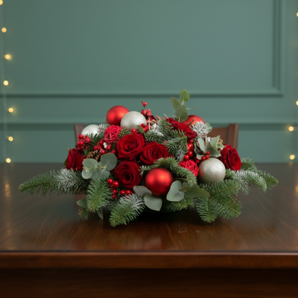 Rustic Christmas Floral Centerpiece with red roses, white chrysanthemums, evergreen pine, and red ornaments in a square wooden box